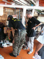 Drug-sniffing soppy black lab on the Amazon boat