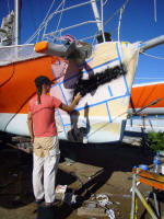 Katya painting her logo for Aransas