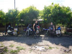 Three English bikers having afternoon coffee at a Nicaraguan Little Chef